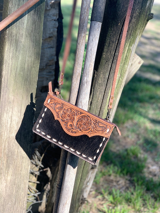 Small tooled/cowhide clutch