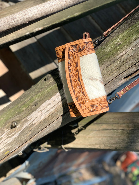 Small tooled/cowhide clutch